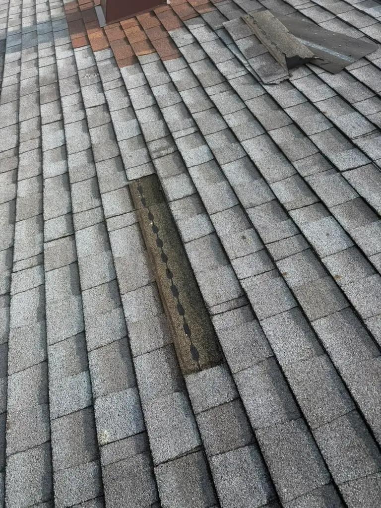 Storm damage signs on a roof - BNJ Contractors blog